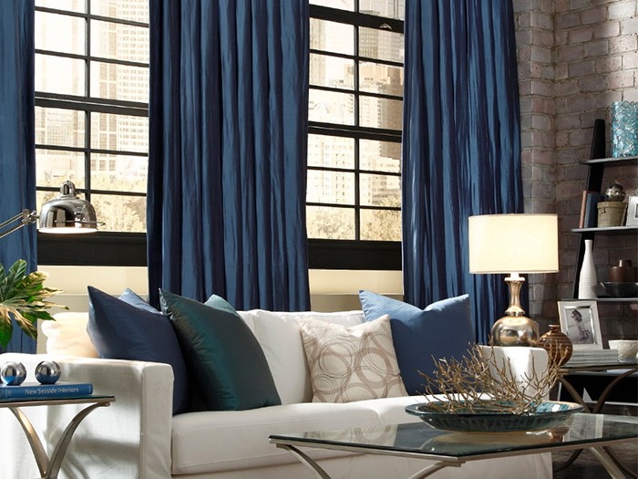 Living room windows featuring Carole Fabrics Drapery Aiden  Color: Dusty Blue